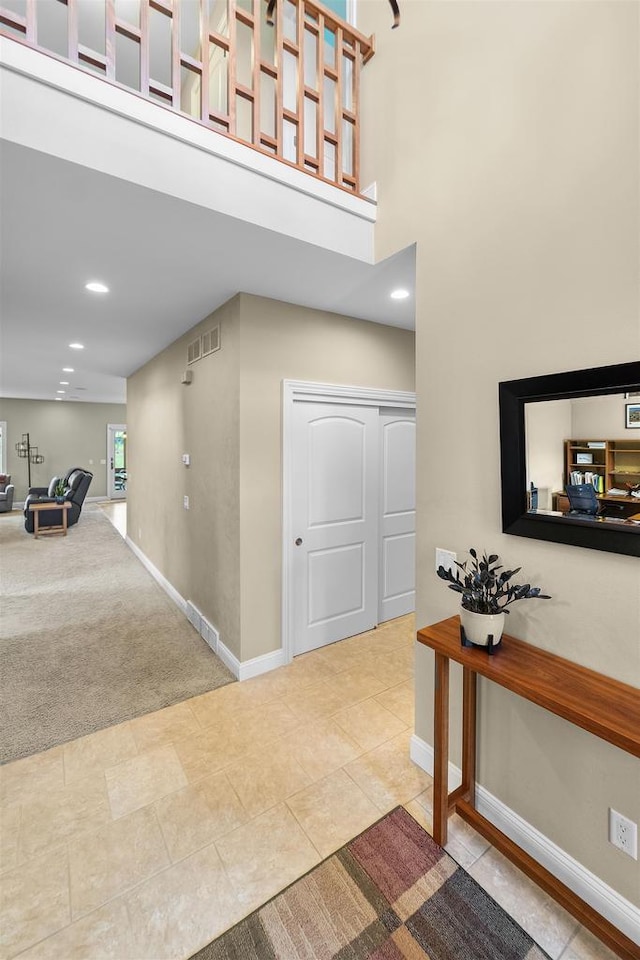 7131 Caneel Trl, Middleton, WI 53562 - hallway with carpet, recessed lighting, and a towering ceiling