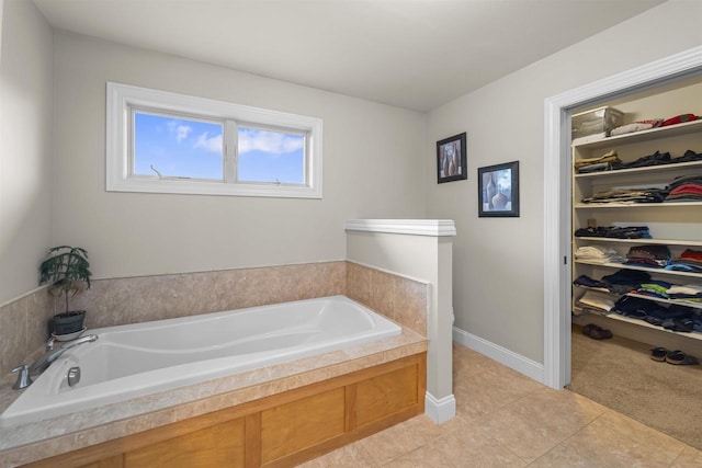 7131 Caneel Trl, Middleton, WI 53562 - full bath featuring a garden tub, a spacious closet, and tile patterned floors