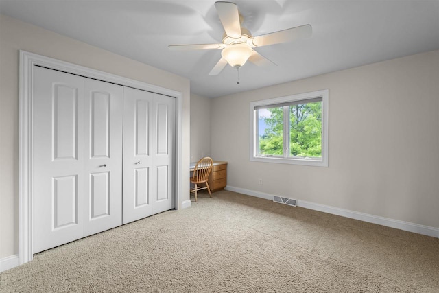 7131 Caneel Trl, Middleton, WI 53562 - unfurnished bedroom with a closet, carpet flooring, and a ceiling fan