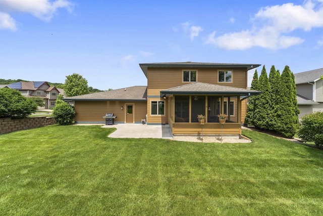 7131 Caneel Trl, Middleton, WI 53562 - rear view of house featuring a patio, a lawn, a sunroom, and roof with shingles