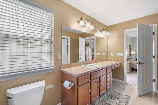 3259 Emmertsen Rd, Racine, WI 53406 - bathroom with ensuite bathroom, vanity, tile patterned floors, and plenty of natural light