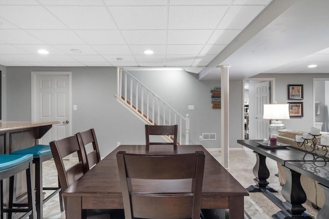 3259 Emmertsen Rd, Racine, WI 53406 - dining room with stairs, recessed lighting, and a paneled ceiling