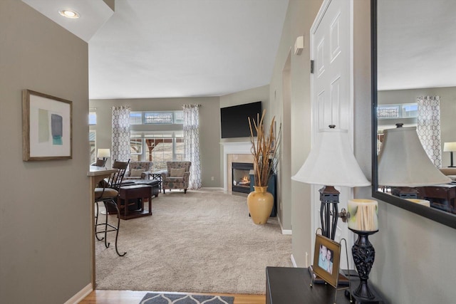 3259 Emmertsen Rd, Racine, WI 53406 - living area featuring healthy amount of natural light, a tiled fireplace, and carpet floors