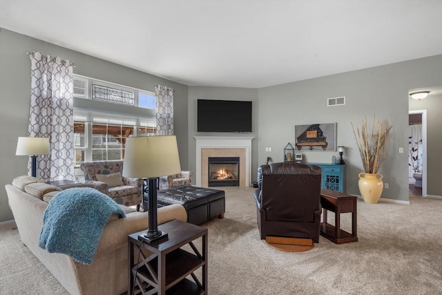 3259 Emmertsen Rd, Racine, WI 53406 - carpeted living area with a tiled fireplace and baseboards