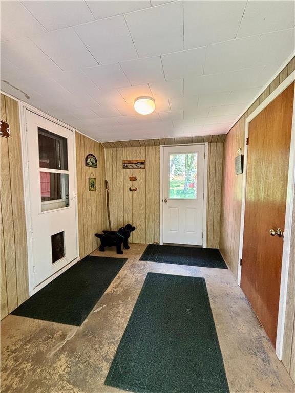 306 Pleasant Ave, Frederic, WI 54837 - entryway with wood walls