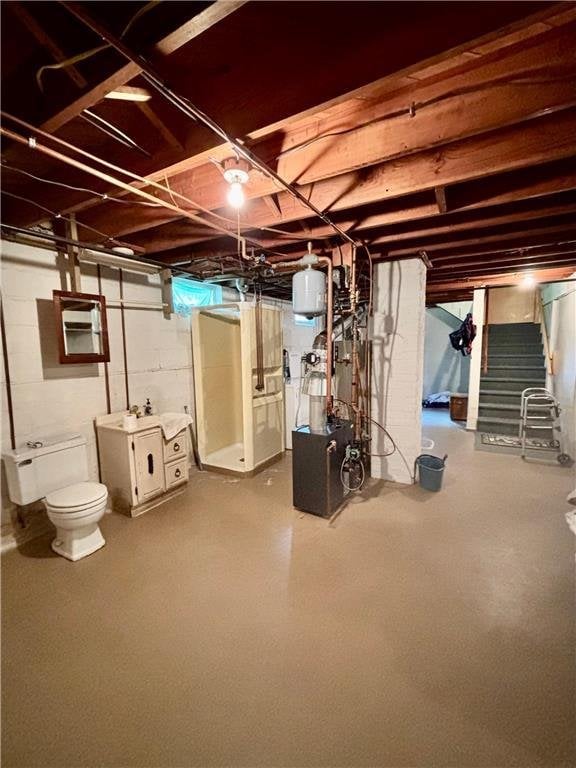 306 Pleasant Ave, Frederic, WI 54837 - unfinished below grade area featuring stairs