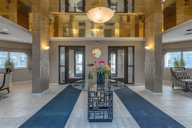 1633 N Prospect Ave Unit 18F, Milwaukee, WI 53202 - lobby with a high ceiling and recessed lighting