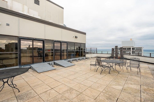 1633 N Prospect Ave Unit 18F, Milwaukee, WI 53202 - view of patio / terrace featuring a water view