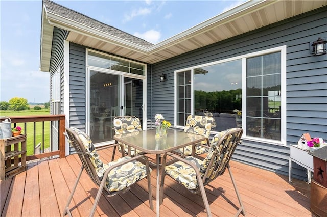 4801 358th St, Stanley, WI 54768 - wooden terrace with outdoor dining area
