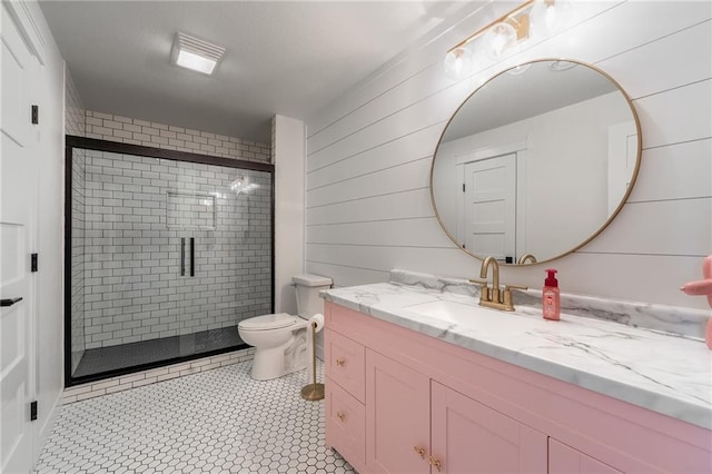 4801 358th St, Stanley, WI 54768 - full bath with vanity, a stall shower, tile patterned floors, and wood walls