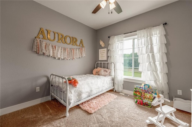4801 358th St, Stanley, WI 54768 - carpeted bedroom featuring baseboards and a ceiling fan