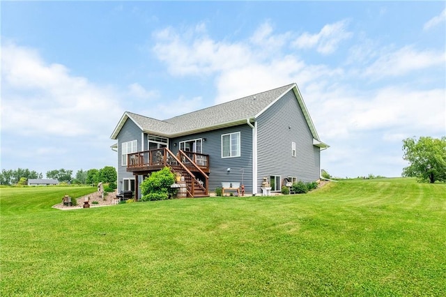 4801 358th St, Stanley, WI 54768 - rear view of house featuring stairs, a deck, and a lawn