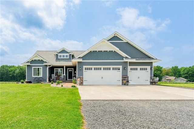 4801 358th St, Stanley, WI 54768 - craftsman-style home with concrete driveway, a front lawn, an attached garage, and a porch