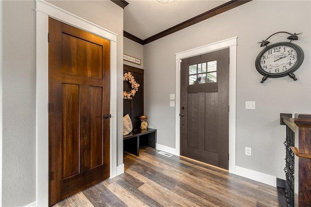 4801 358th St, Stanley, WI 54768 - entrance foyer featuring wood finished floors and crown molding