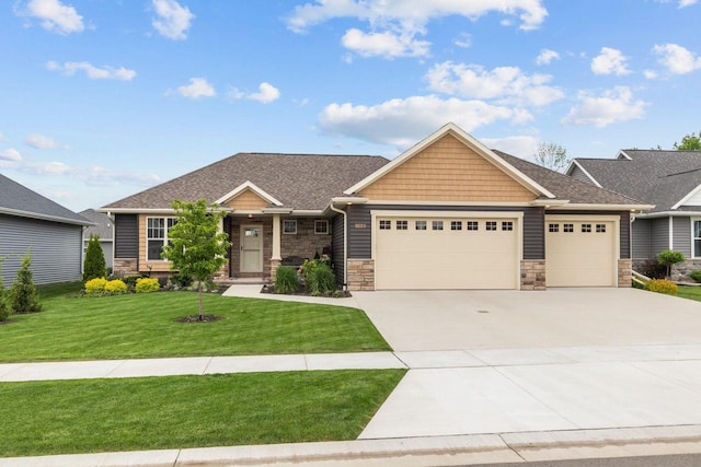 N9225 Constellation Dr, Appleton, WI 54915 - craftsman inspired home featuring a garage, stone siding, and a front lawn