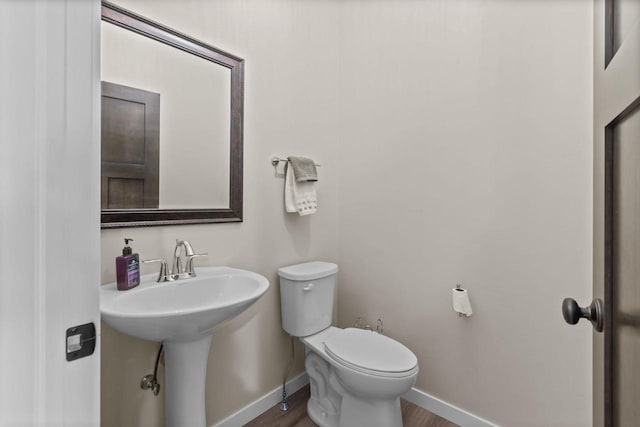 N9225 Constellation Dr, Appleton, WI 54915 - half bath featuring baseboards and wood finished floors