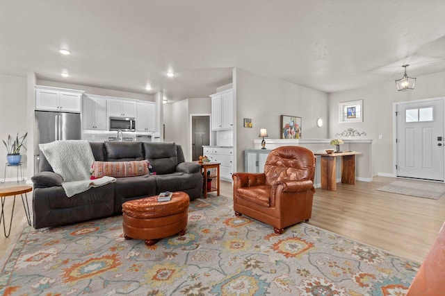 N9225 Constellation Dr, Appleton, WI 54915 - living room featuring light wood finished floors and recessed lighting