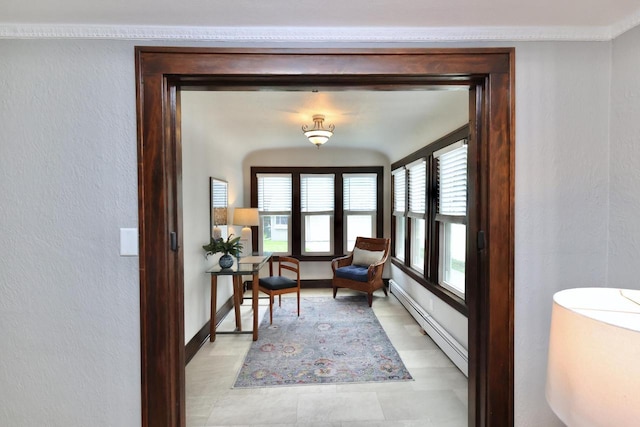 1522 S Sunny Slope Rd, New Berlin, WI 53151 - sitting room featuring baseboard heating, healthy amount of natural light, a textured wall, and light floors
