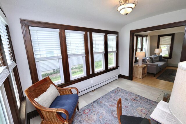 1522 S Sunny Slope Rd, New Berlin, WI 53151 - sitting room featuring a baseboard heating unit, healthy amount of natural light, and baseboard heating