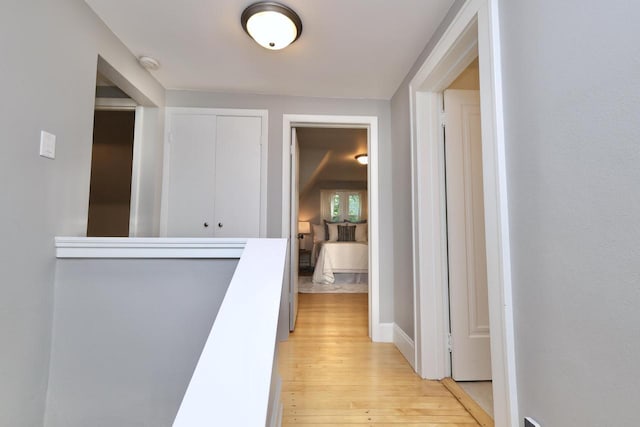 1522 S Sunny Slope Rd, New Berlin, WI 53151 - hall featuring light wood-style floors and an upstairs landing