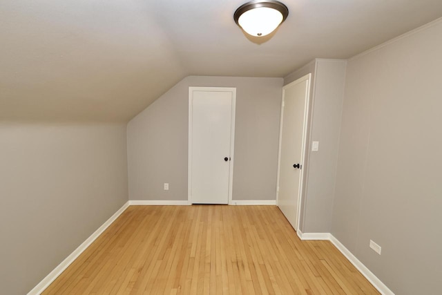 1522 S Sunny Slope Rd, New Berlin, WI 53151 - bonus room featuring light wood finished floors and lofted ceiling