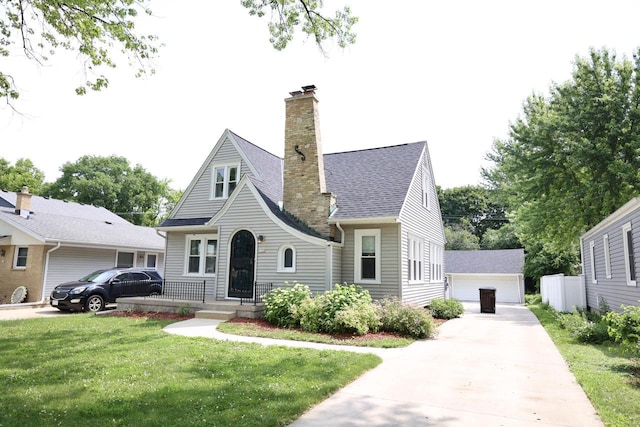 1522 S Sunny Slope Rd, New Berlin, WI 53151 - view of front of property with a chimney, an outdoor structure, a front lawn, and a garage