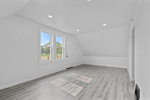 3425 N 20th St, Milwaukee, WI 53206 - additional living space featuring lofted ceiling, wood finished floors, and recessed lighting