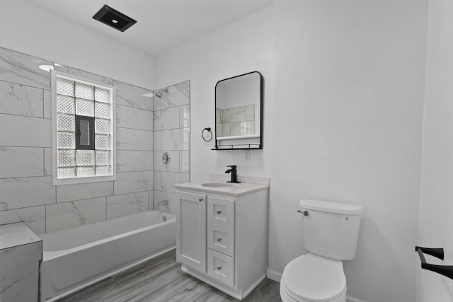 3425 N 20th St, Milwaukee, WI 53206 - bathroom featuring vanity,  shower combination, and wood finished floors