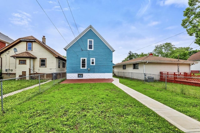 3425 N 20th St, Milwaukee, WI 53206 - rear view of house featuring a fenced backyard and a patio area
