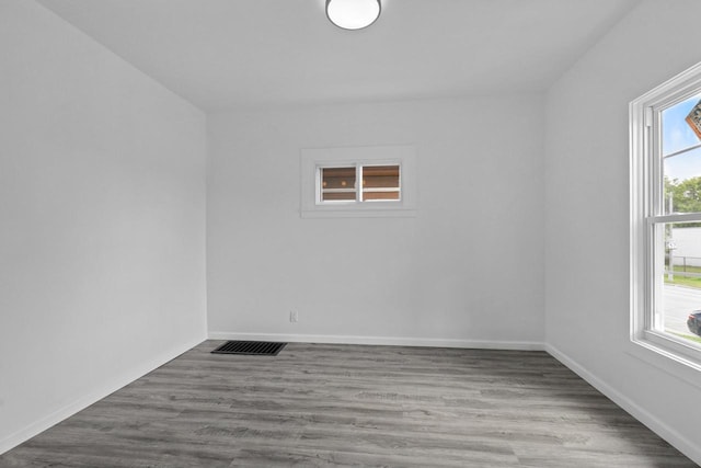 3425 N 20th St, Milwaukee, WI 53206 - unfurnished room with wood finished floors and baseboards