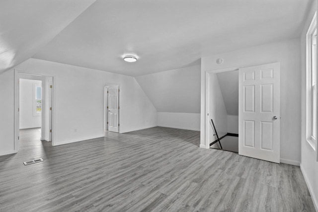 3425 N 20th St, Milwaukee, WI 53206 - bonus room featuring lofted ceiling and wood finished floors
