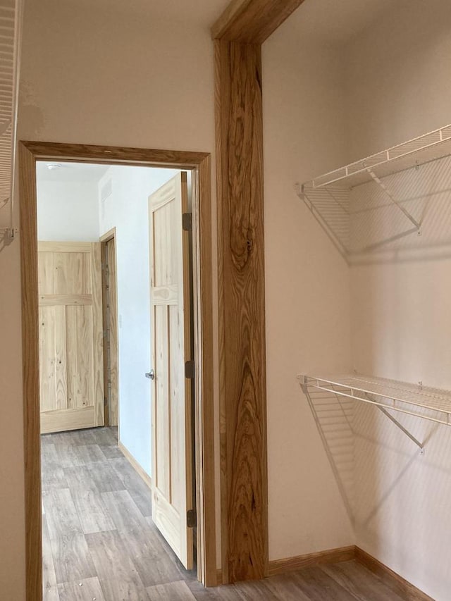 501 View St, Tomah, WI 54660 - walk in closet featuring wood finished floors