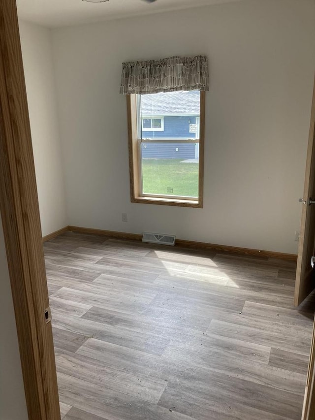 501 View St, Tomah, WI 54660 - unfurnished room with light wood-style flooring