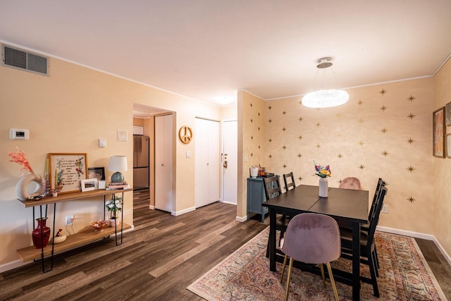 1906 E Shorewood Blvd Unit 250, Shorewood, WI 53211 - dining room featuring dark wood-style floors and crown molding