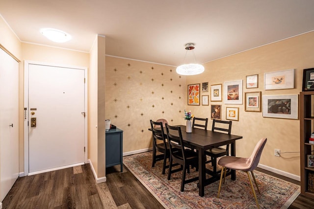 1906 E Shorewood Blvd Unit 250, Shorewood, WI 53211 - dining area with dark wood-style flooring and crown molding