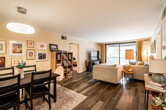 1906 E Shorewood Blvd Unit 250, Shorewood, WI 53211 - living area with a chandelier and dark wood finished floors