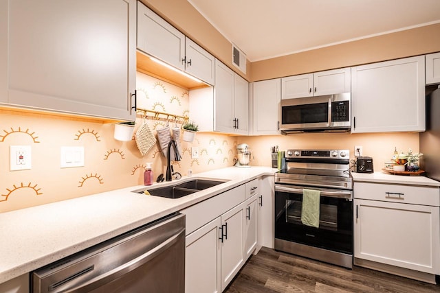 1906 E Shorewood Blvd Unit 250, Shorewood, WI 53211 - kitchen featuring stainless steel appliances, light countertops, and white cabinets