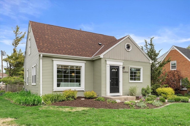 10836 W Fiebrantz Ave, Wauwatosa, WI 53222 - view of front of house featuring a front yard and roof with shingles