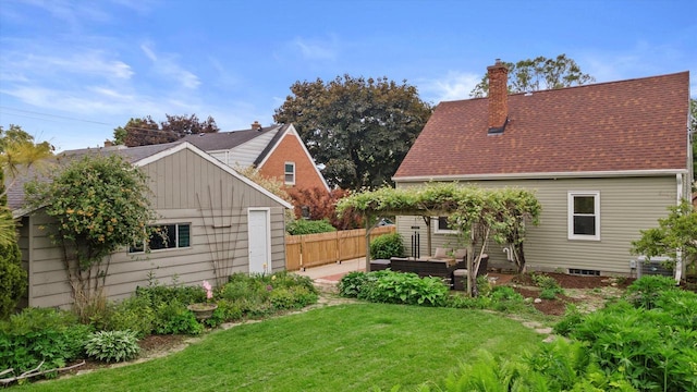 10836 W Fiebrantz Ave, Wauwatosa, WI 53222 - view of yard featuring an outdoor living space and a patio