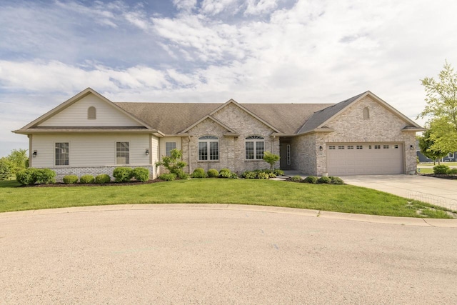 12907 78th Pl, Bristol, WI 53104 - view of front of house with driveway, brick siding, an attached garage, a front yard, and roof with shingles