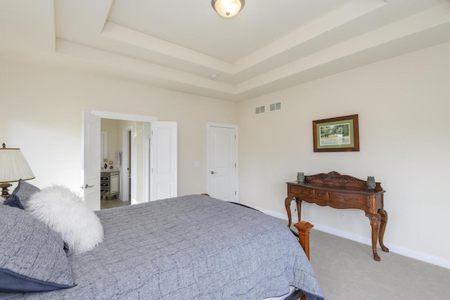 12907 78th Pl, Bristol, WI 53104 - carpeted bedroom featuring a tray ceiling and baseboards