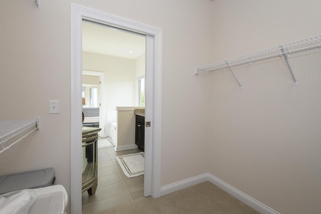 12907 78th Pl, Bristol, WI 53104 - spacious closet with dark tile patterned flooring