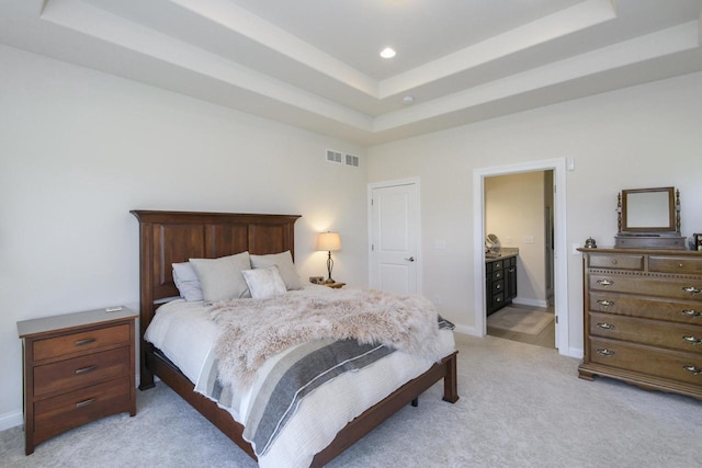 12907 78th Pl, Bristol, WI 53104 - bedroom with light carpet, a tray ceiling, and recessed lighting