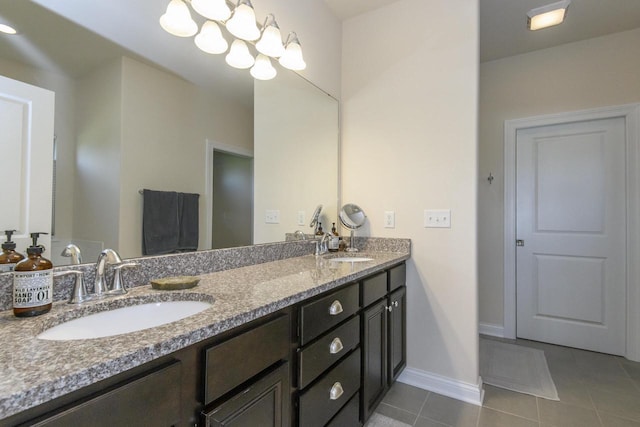 12907 78th Pl, Bristol, WI 53104 - bathroom with double vanity, tile patterned flooring, and a chandelier