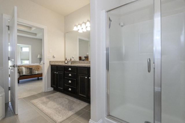 12907 78th Pl, Bristol, WI 53104 - full bathroom with connected bathroom, vanity, a stall shower, and tile patterned flooring