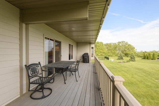 12907 78th Pl, Bristol, WI 53104 - wooden deck featuring a lawn, grilling area, and outdoor dining space