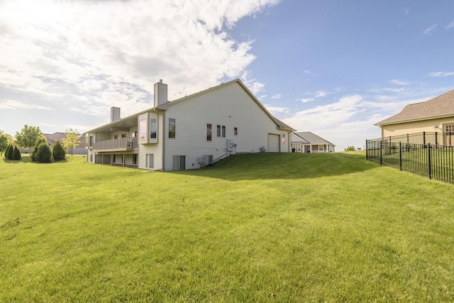 12907 78th Pl, Bristol, WI 53104 - rear view of house featuring a chimney and a balcony