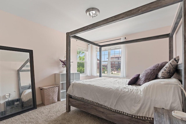 9414 Harvest Moon Ln, Verona, WI 53593 - carpeted bedroom featuring beam ceiling