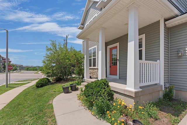 9414 Harvest Moon Ln, Verona, WI 53593 - view of side of home with a porch and a lawn