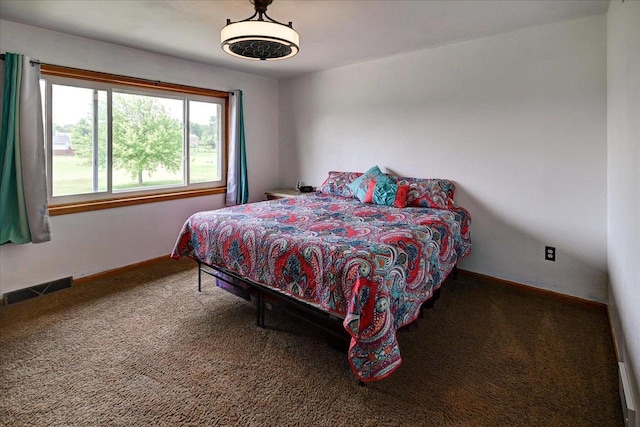 830 Violet Ln, Oregon, WI 53575 - carpeted bedroom featuring baseboards